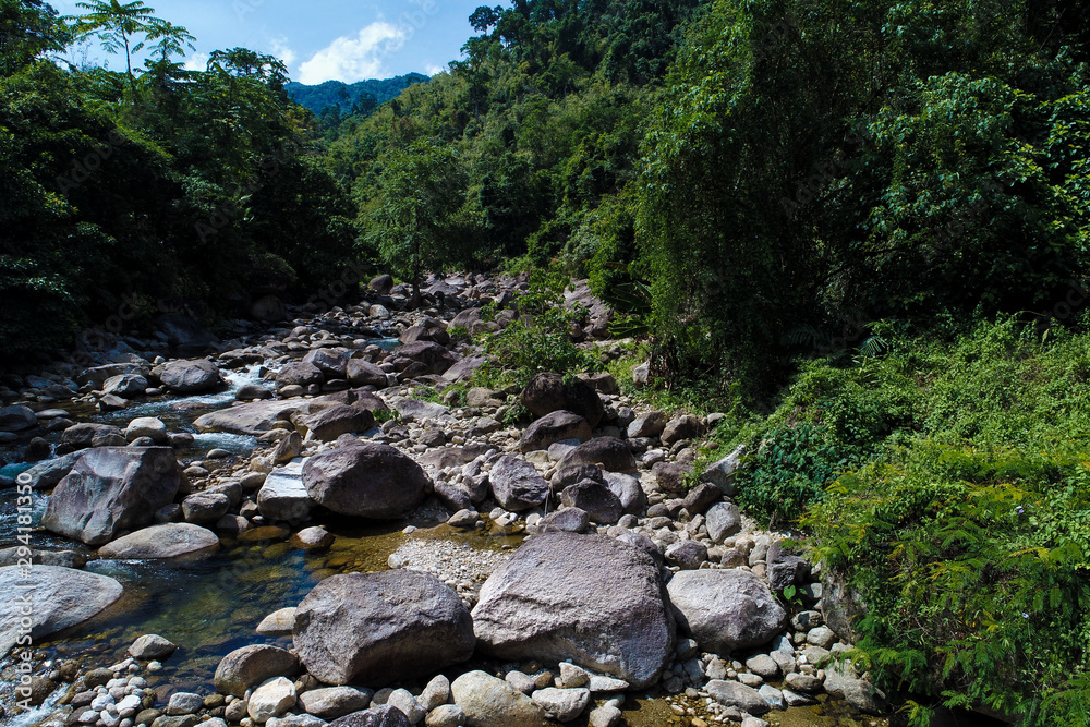 Aerial view waterfall in deep tropical rain forest