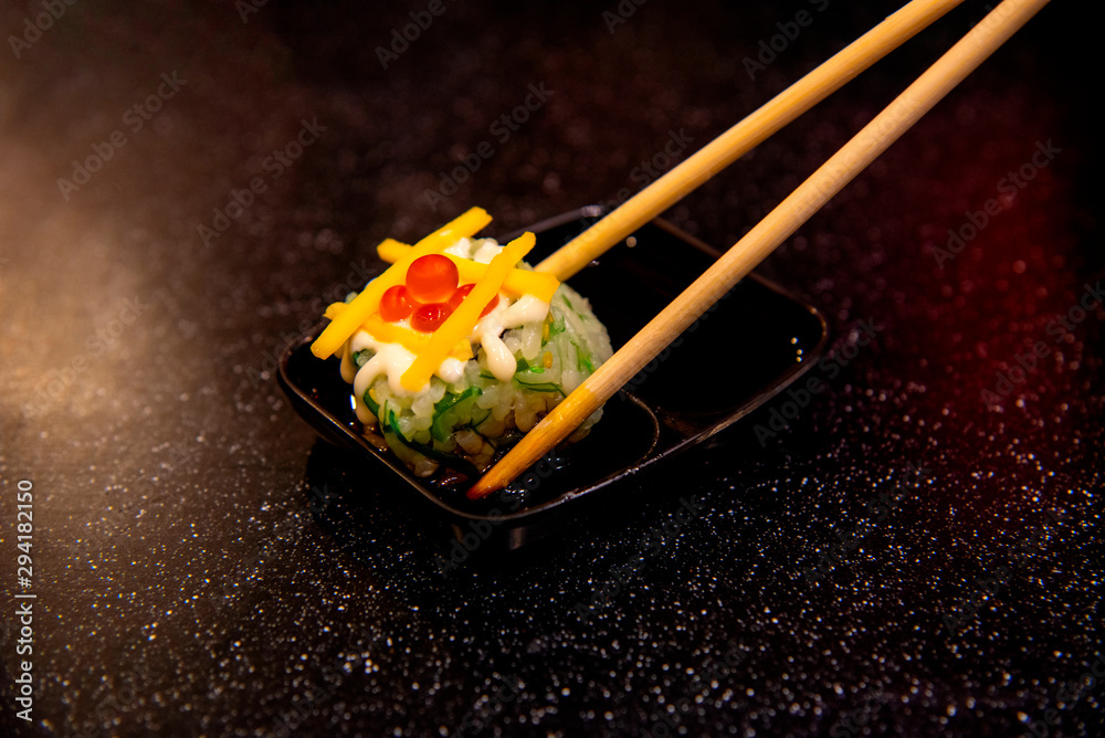 Rice Sushi is a lump of meat and eaten with sauce is a popular dish in Thailand Rice Sushi is a lump of meat and eaten with sauce is a popular dish in Thailand