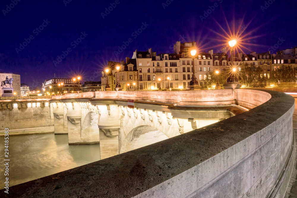 The pont Neuf is the oldest standing bridge across the river Seine in Paris.