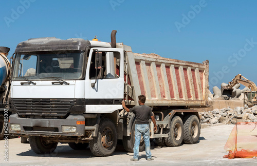Rethymno, Western Crete, Greece. September 2019. Haulage truck on a building site being cleared for development.