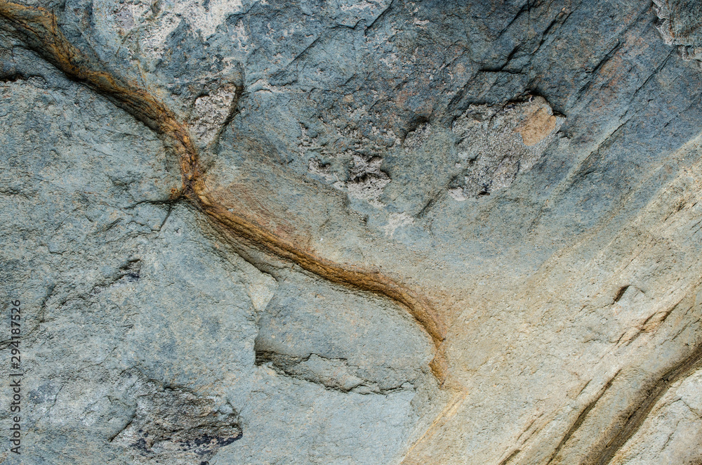 pierre roche bleue et fissure orange en diagonale pierre roche bleue et fissure orange en diagonale