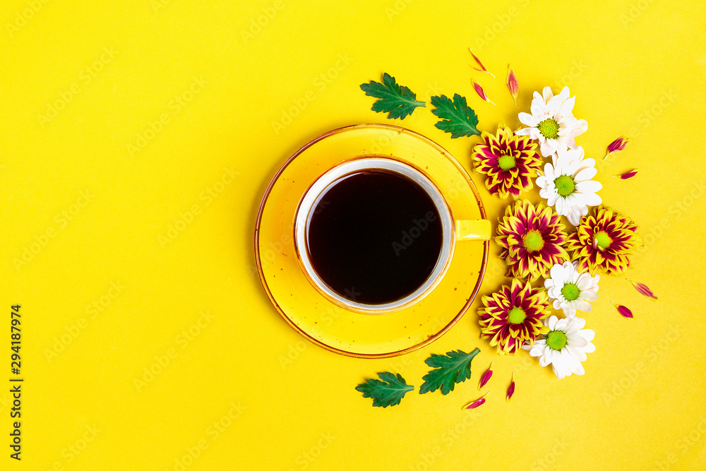 pattern of flowers of red and white asters, green leaves and a cup of hot coffee Americano on yellow background Flat lay Top view Mock up Sesonal concept Hello autumn, spring or summer, Good morning pattern of flowers of red and white asters, green leaves and a cup of hot coffee Americano on yellow background Flat lay Top view Mock up Sesonal concept Hello autumn, spring or summer, Good morning