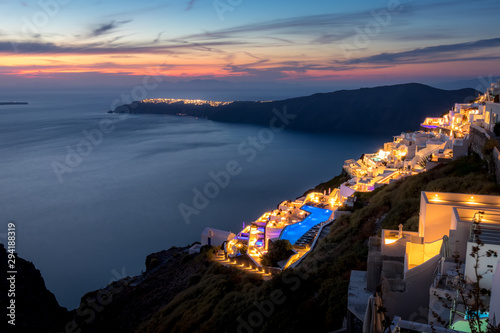 The capital of the island of Santorini Thira at twilight. photo