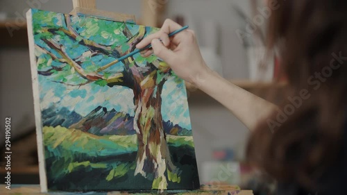 Final touches on landscape painting