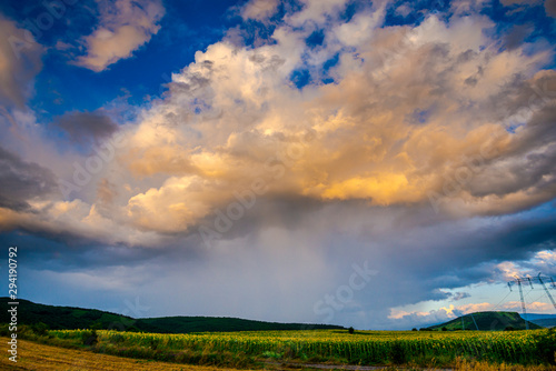 Storm clouds in the summer at the sunset