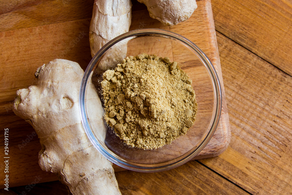 Fototapeta premium Ginger root on a wooden table
