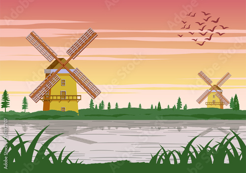 famous symbol of Holland,wind mill around with beautiful nature,vintage color