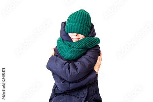 Frozen girl in down jacket isolated on white