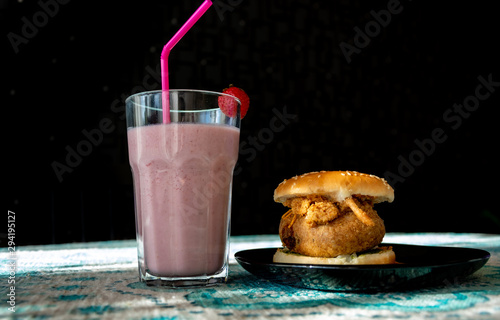 Wada pao and strawberry milkshake , traditional maharastrian pao photo