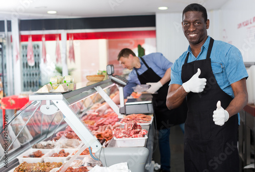 Satisfied African American butcher © JackF