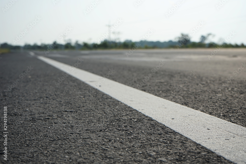 Road traffic paint White on the asphalt surface Road traffic paint White on the asphalt surface