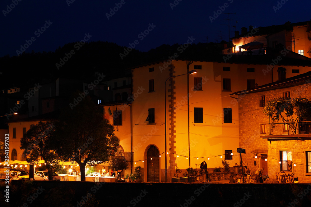 Beautiful street of tuscan Stia town by night