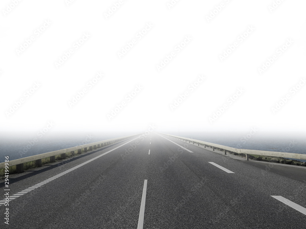 Fototapeta premium lonesome empty road leading straight forwards through the water and gets lost in the fog