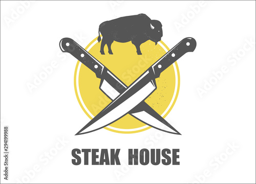 Steak house label. With knives and buffalo.