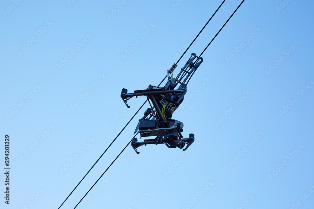 Camera hangs on cables for events Camera hangs on cables for events