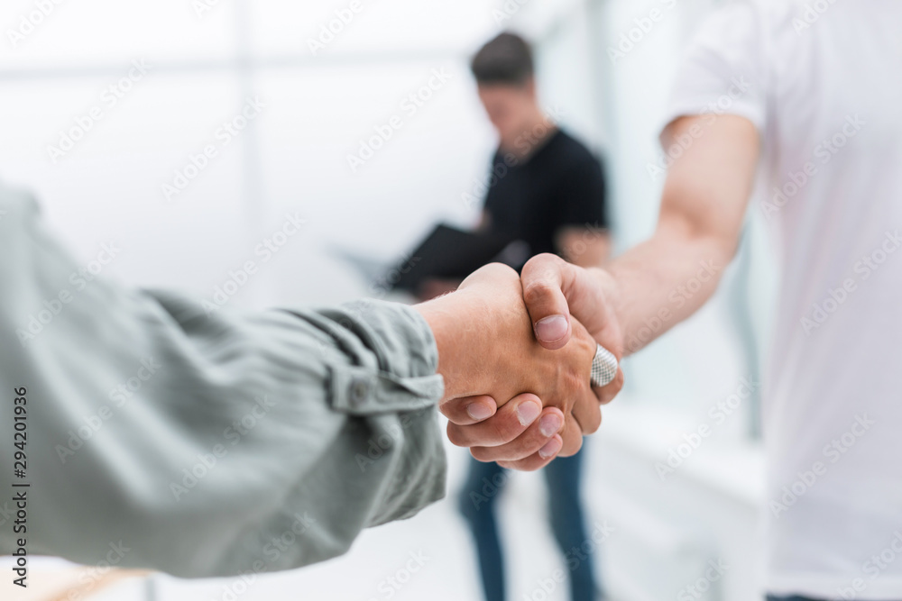 close up. background image of a business handshake close up. background image of a business handshake