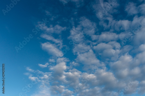 Blue sky with clouds as background  copy space  texture