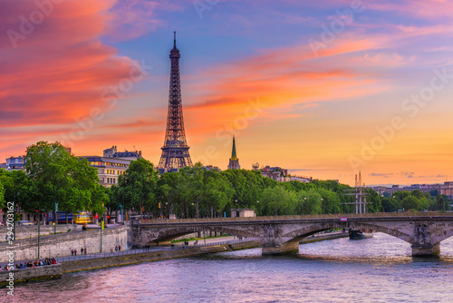 Sunset view of Eiffel tower and Seine river in Paris, France. Eiffel Tower is one of the most iconic landmarks of Paris. Cityscape of Paris © Ekaterina Belova