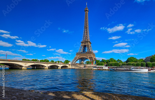 Paris Eiffel Tower and river Seine in Paris, France. Eiffel Tower is one of the most iconic landmarks of Paris. Cityscape of Paris