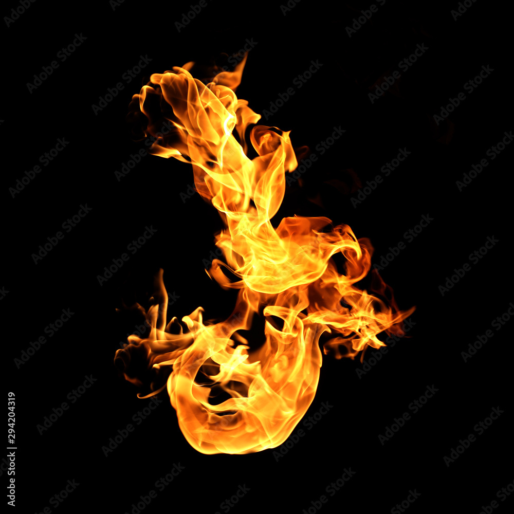 Fototapeta premium Fire flames on a black background.