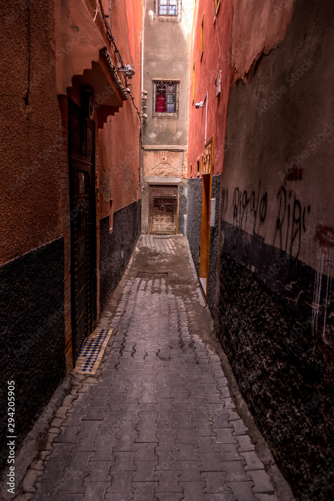 Close up view on a narrow street in the medina. Marrakech, Morocco.