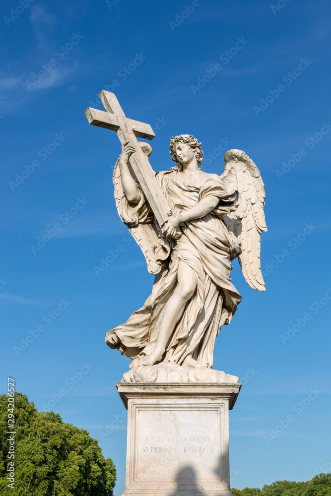 Statue of an angel on the foot bridge of the Holy Angel across the Tiber River in Rome