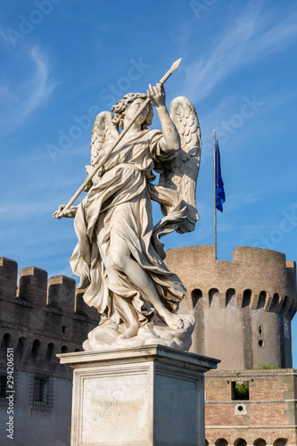 Statue of an angel on the foot bridge of the Holy Angel across the Tiber River in Rome