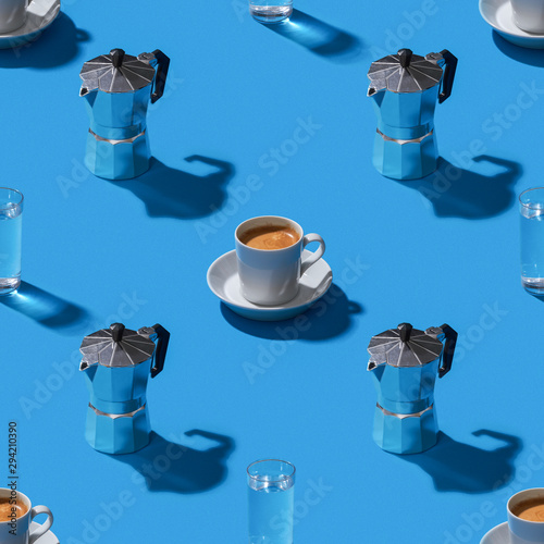 Espresso and moka pot  on blue background seamless pattern stock photo