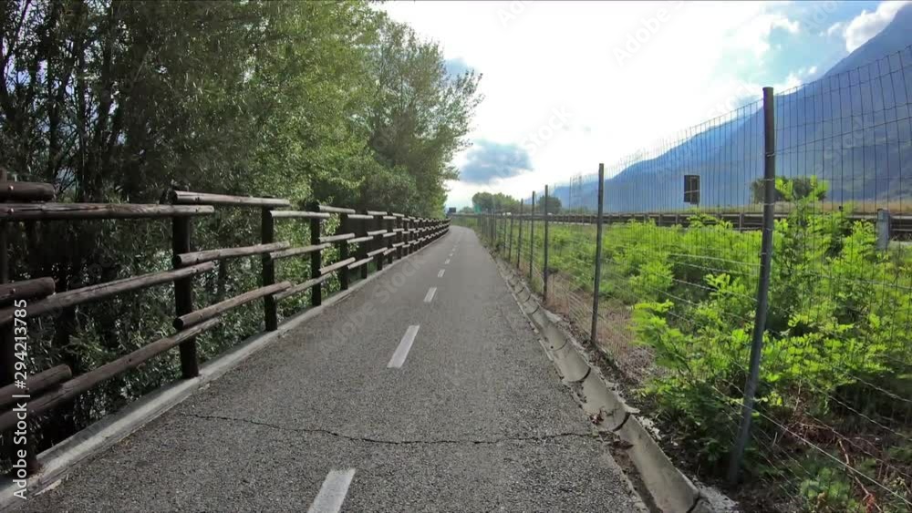 Velodoire bicycle path along the Dora Baltea next to Brissogne, Aosta Valley, Italy Velodoire bicycle path along the Dora Baltea next to Brissogne, Aosta Valley, Italy