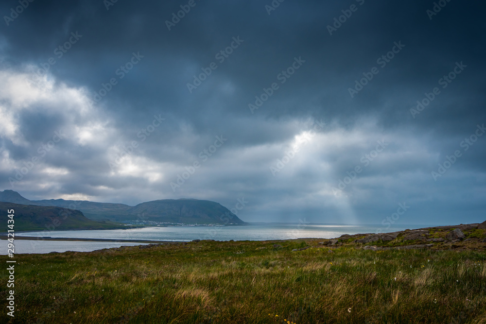 Beautiful view of the Icelandic bay with sunbeams
