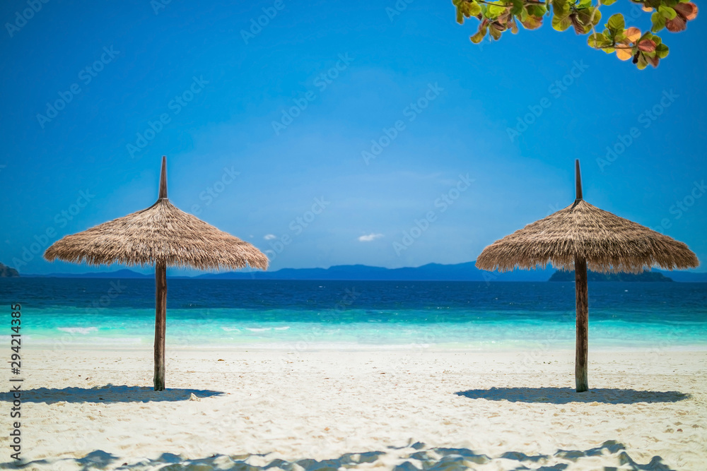 Umbrella wooden on tropical beach.