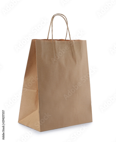 Empty craft paper bag isolated on white. Mockup for design