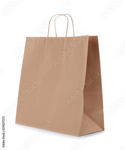 Empty craft paper bag isolated on white. Mockup for design