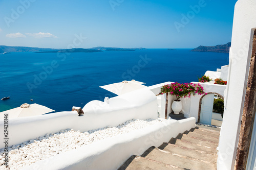 White cycladic architecture and blue sea on Santorini island, Greece. Summer holidays, travel destinations concept