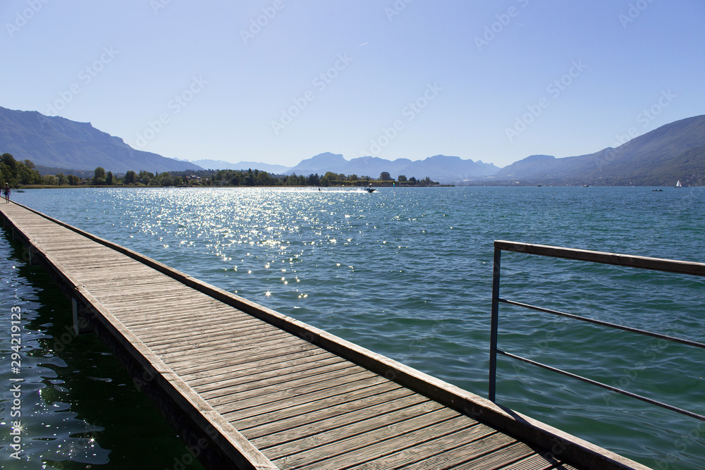 wooden pier on lake bourget panorama view france europe alps mountain travel tour