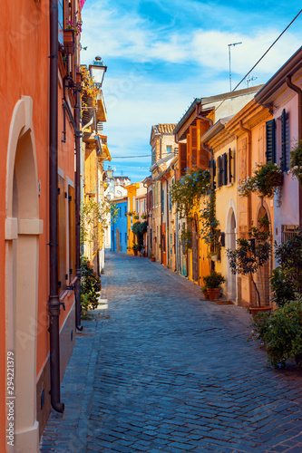 Ancient houses on the picturesque Via Marecchia in Borgo San Giuliano, Rimini, Italy.