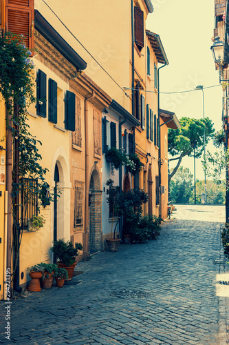 Ancient houses on the picturesque Via Marecchia in Borgo San Giuliano, Rimini, Italy. photo