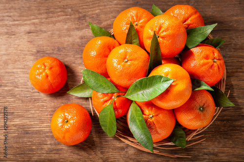 Fresh mandarin oranges fruit or tangerines with leaves, top view