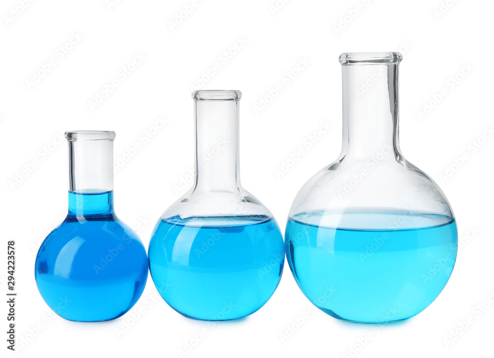 Laboratory glassware with blue liquids isolated on white Laboratory glassware with blue liquids isolated on white