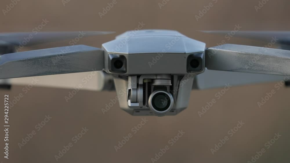 Drone flying outdoor closeup shot, camera tilting up