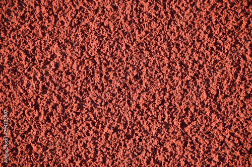 Stadium red rubber treadmill texture