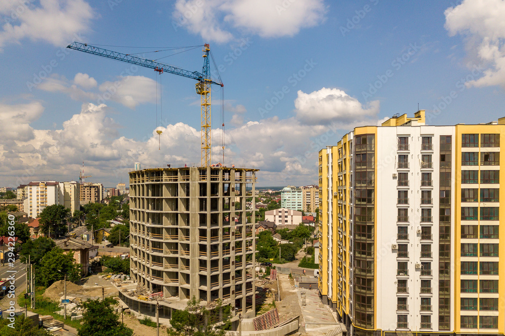 Apartment or office tall concrete building under construction.