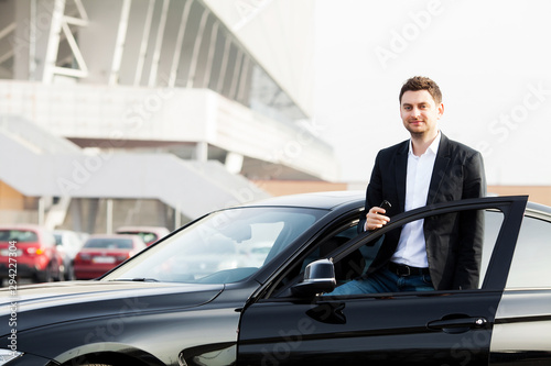 Young happy man bought new modern car. © Maksymiv Iurii