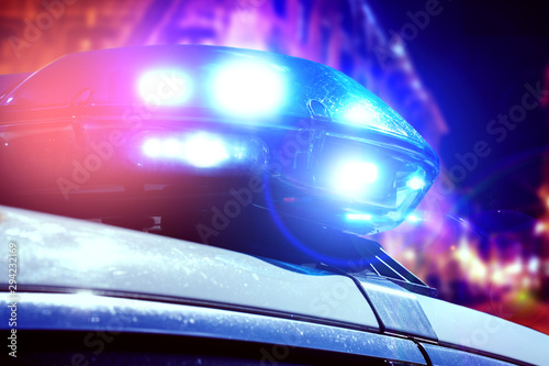 Photography Blue and red light flasher of a patrol police car at night