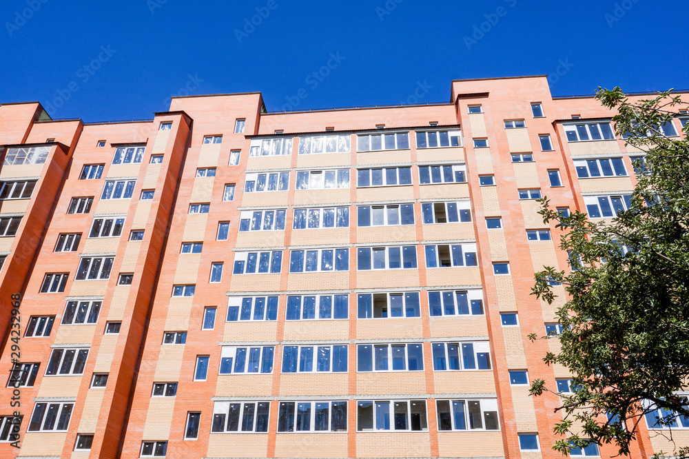 Modern and new apartment building. Multistoried, modern, new and stylish living block of flats. Real estate. New house. Newly built block of flats Modern and new apartment building. Multistoried, modern, new and stylish living block of flats. Real estate. New house. Newly built block of flats