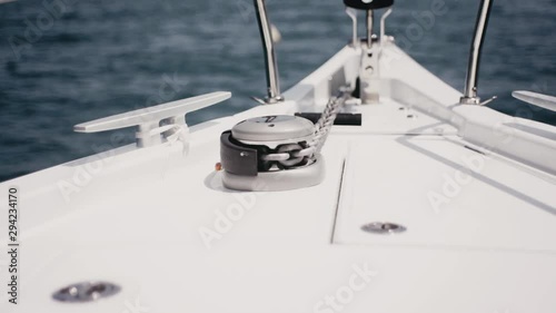 Close up of nautical anchor winch and chain on a luxury super yacht.