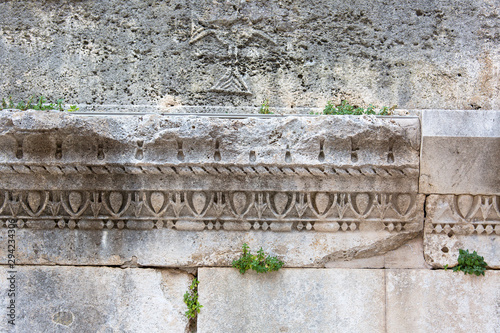 Fragment of the remains of the 3rd century Diocletian Palace, wall with ancient relief, Split, Croatia