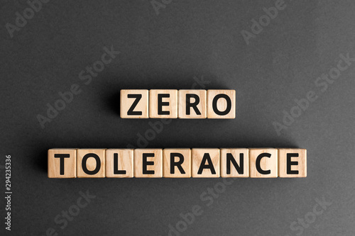Bild auf Leinwand Zero tolerance - words from wooden blocks with letters, severely punishing all u