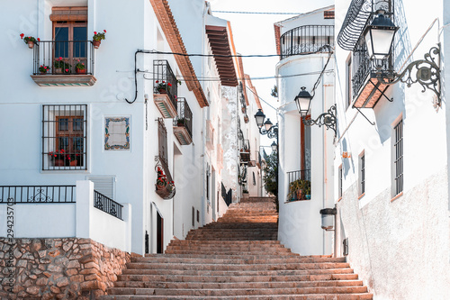 Fototapete Street of a snow-white southern town on the hills, Altea, Spain, Apr