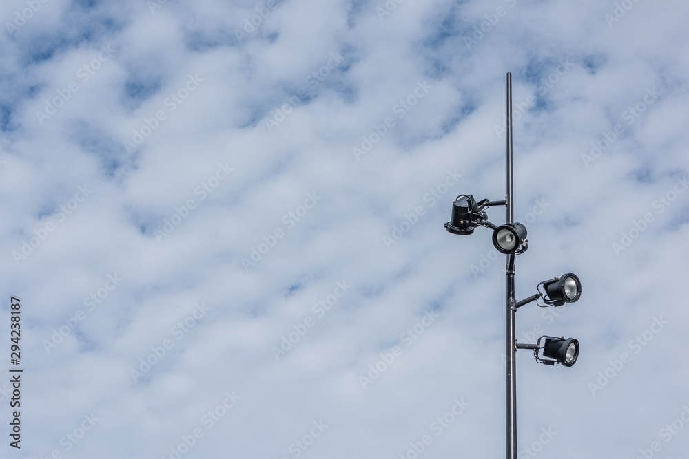 party lights on a stand against an empty sky party lights on a stand against an empty sky